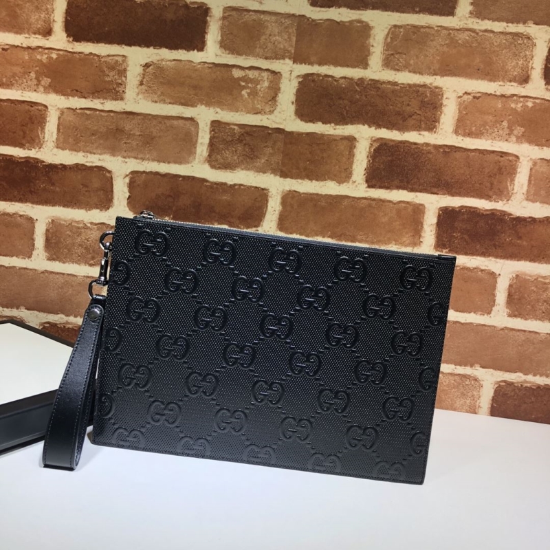 G*u*i clutch bags